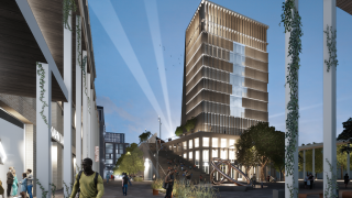 Digitaalinen havainnekuva osaamiskampuksen kävelykadusta ilta-aikaan.